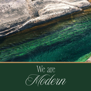 Elorae Jewelry and Accessories "We Are Modern" attribute text on a green background with an emerald and stone clearwater image.