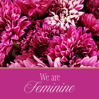 Elorae Jewelry and Accessories "We are Feminine" attribute text on a pink background with pink flowers.