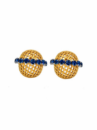 A pair of gold-toned stud earrings with a spherical openwork mesh design and a horizontal row of deep blue gemstones across the front, set against a plain white background.