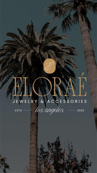 Eloraé jewelry and accessories brand logo with palm trees in the background