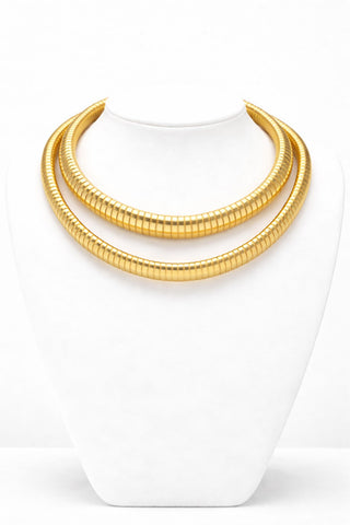 Elorae Jewelry and Accessories gold Torque Choker necklace set 16mm and 12mm on a white mannequin bust against a white background